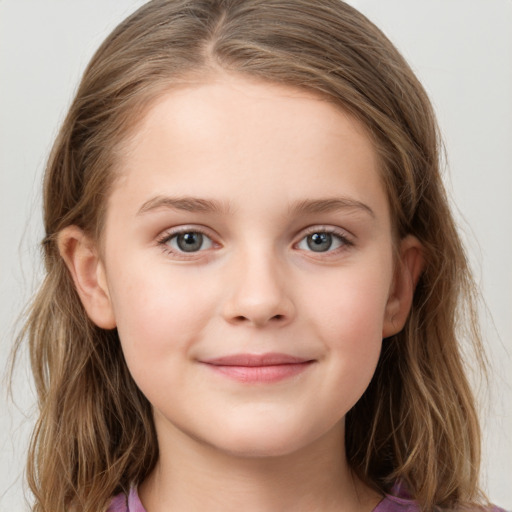 Joyful white child female with medium  brown hair and grey eyes