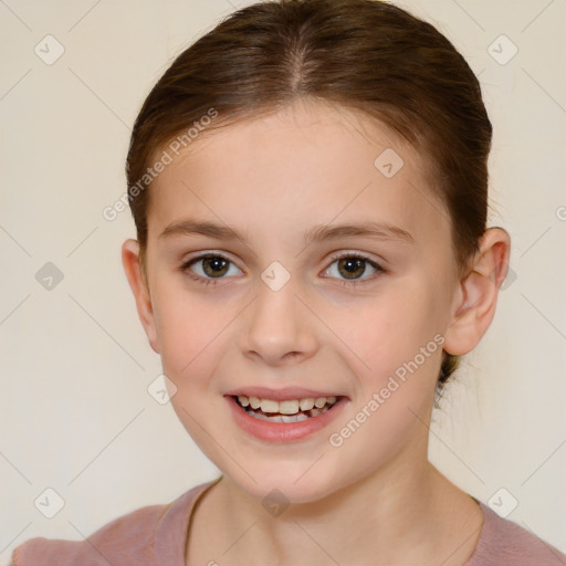 Joyful white child female with short  brown hair and brown eyes