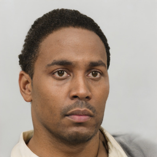 Neutral black young-adult male with short  brown hair and brown eyes