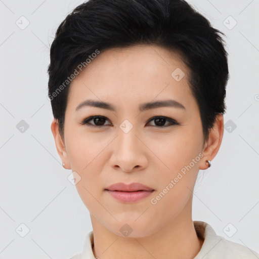 Joyful asian young-adult female with short  black hair and brown eyes