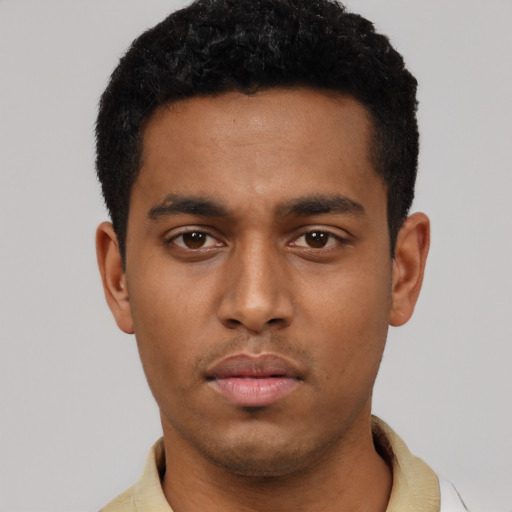 Neutral black young-adult male with short  black hair and brown eyes