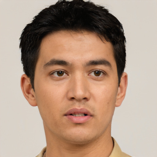 Neutral white young-adult male with short  black hair and brown eyes