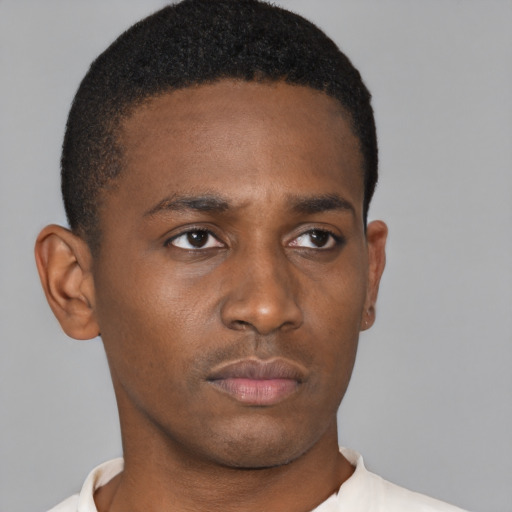 Neutral black young-adult male with short  brown hair and brown eyes
