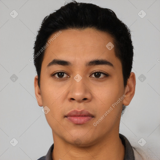 Neutral latino young-adult male with short  black hair and brown eyes