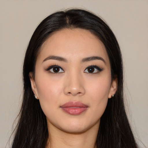 Neutral white young-adult female with long  black hair and brown eyes
