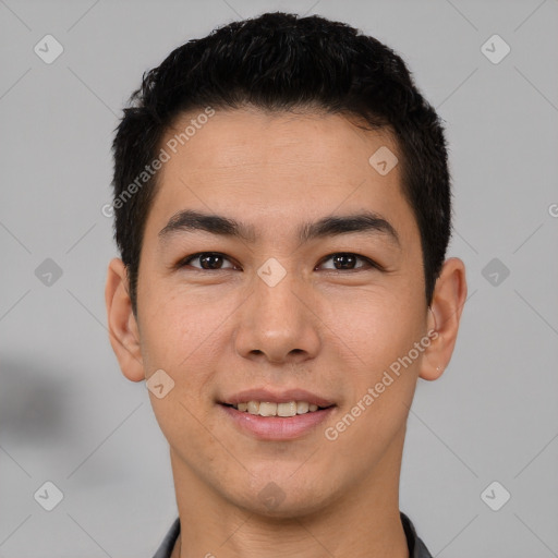 Joyful latino young-adult male with short  brown hair and brown eyes