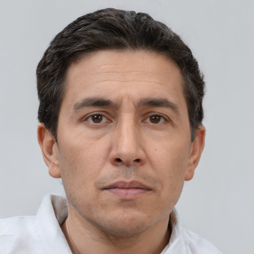 Neutral white adult male with short  brown hair and brown eyes