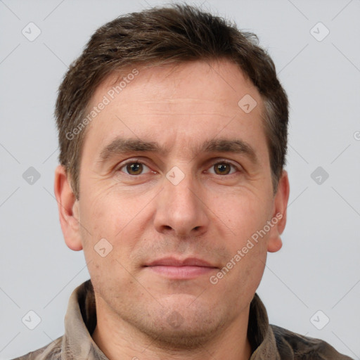 Neutral white adult male with short  brown hair and grey eyes