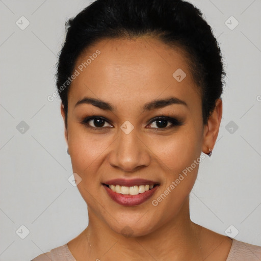 Joyful latino young-adult female with short  black hair and brown eyes