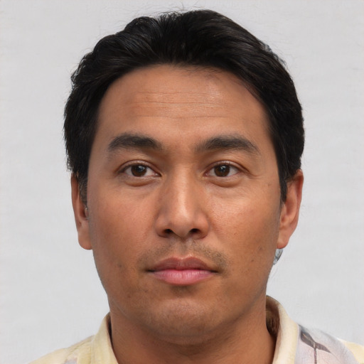 Neutral asian young-adult male with short  brown hair and brown eyes