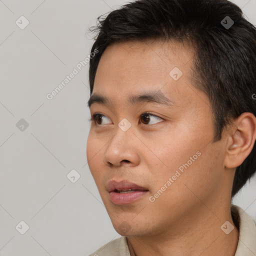 Neutral asian young-adult male with short  black hair and brown eyes