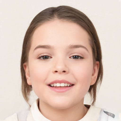 Joyful white child female with medium  brown hair and brown eyes