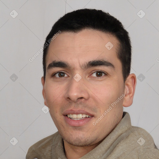 Joyful white young-adult male with short  black hair and brown eyes