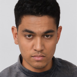 Neutral asian young-adult male with short  brown hair and brown eyes