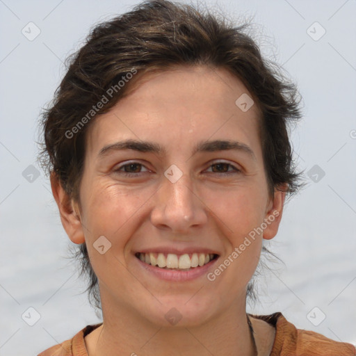 Joyful white adult female with short  brown hair and brown eyes