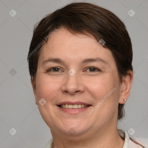 Joyful white adult female with short  brown hair and brown eyes