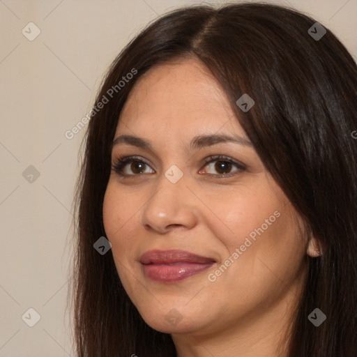 Joyful white young-adult female with long  brown hair and brown eyes