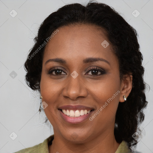 Joyful latino young-adult female with long  brown hair and brown eyes