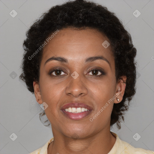 Joyful black young-adult female with short  brown hair and brown eyes