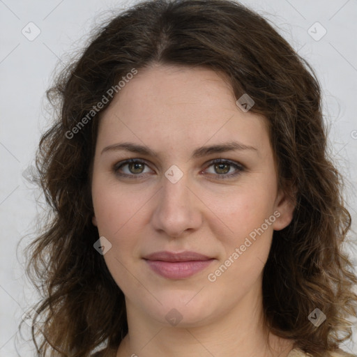 Joyful white young-adult female with medium  brown hair and green eyes