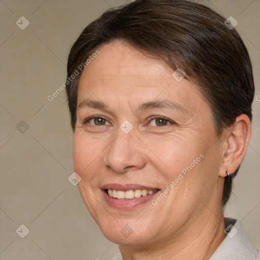 Joyful white adult female with medium  brown hair and brown eyes