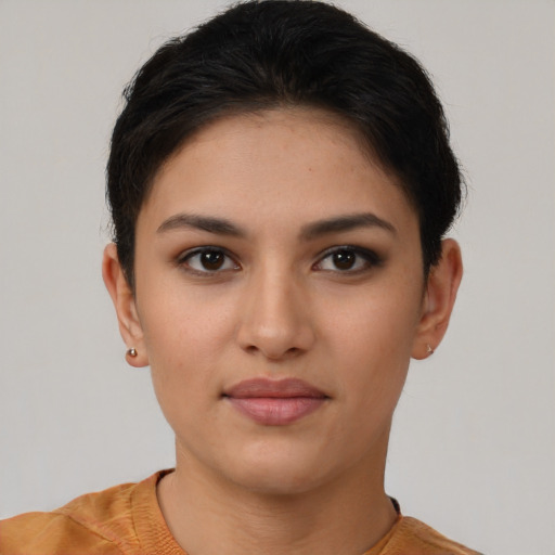 Joyful white young-adult female with short  brown hair and brown eyes