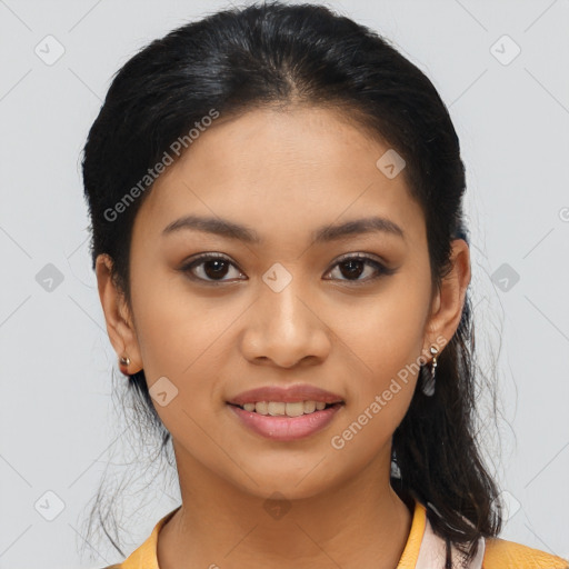 Joyful latino young-adult female with medium  black hair and brown eyes