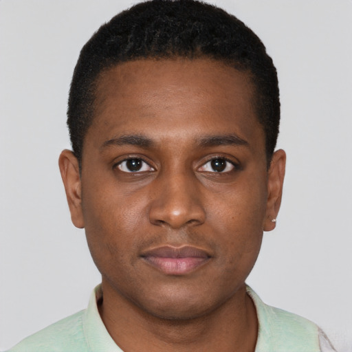 Neutral black young-adult male with short  brown hair and brown eyes