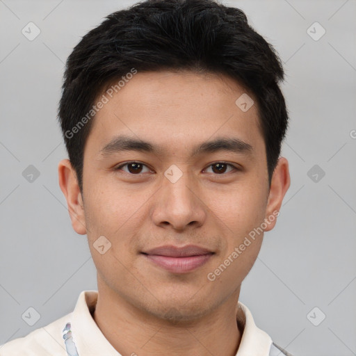 Joyful asian young-adult male with short  brown hair and brown eyes