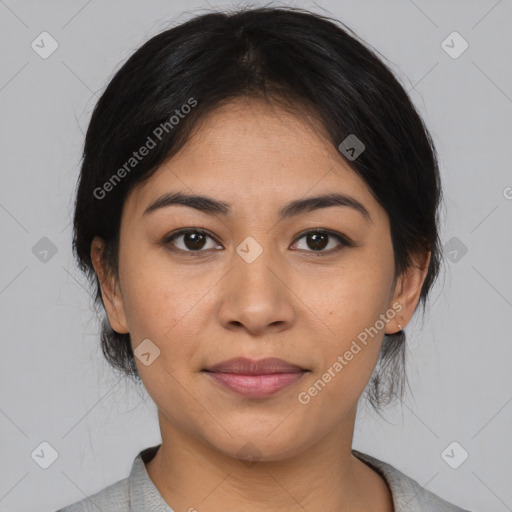 Joyful asian young-adult female with medium  black hair and brown eyes