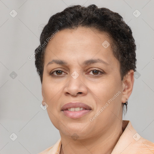 Joyful white adult female with short  brown hair and brown eyes