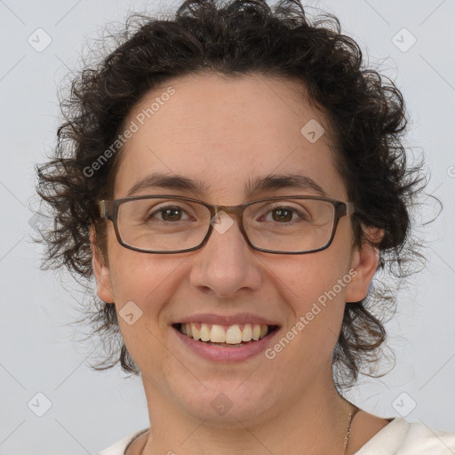 Joyful white adult female with short  brown hair and brown eyes