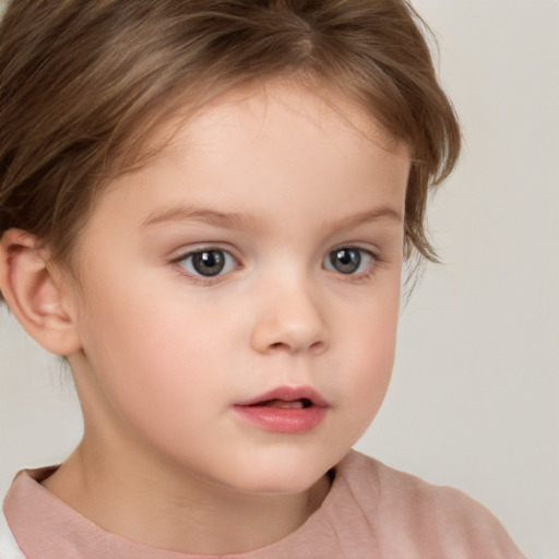 Neutral white child female with short  brown hair and brown eyes