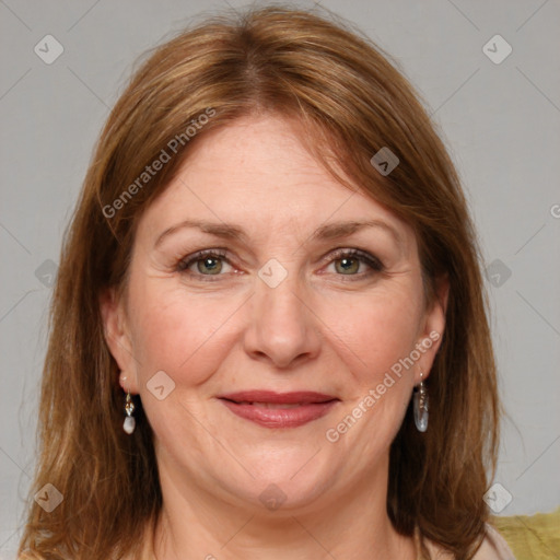 Joyful white adult female with medium  brown hair and grey eyes