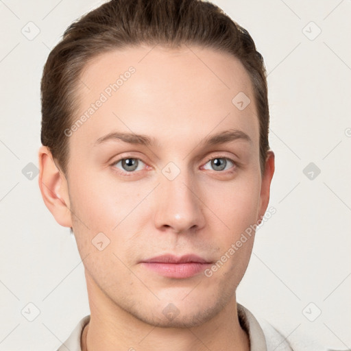 Neutral white young-adult male with short  brown hair and grey eyes