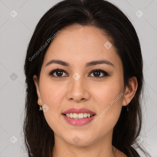 Joyful latino young-adult female with long  brown hair and brown eyes