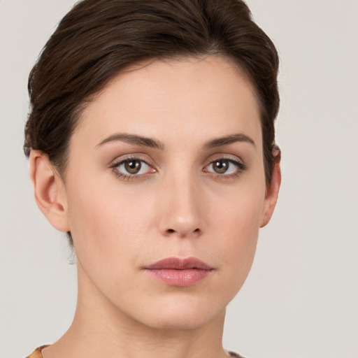 Neutral white young-adult female with short  brown hair and brown eyes