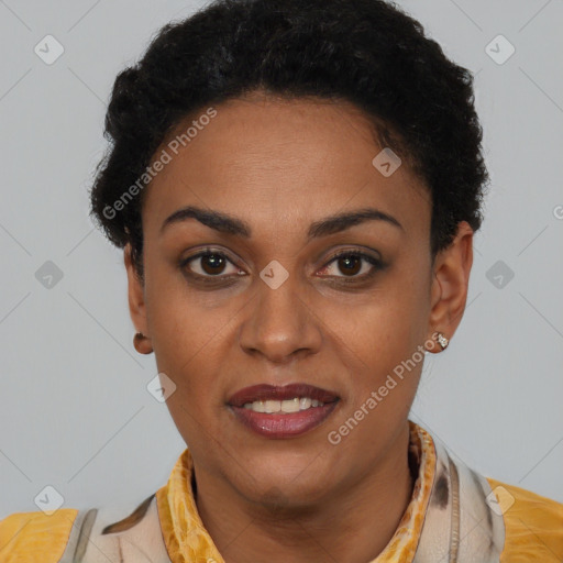 Joyful black young-adult female with short  brown hair and brown eyes