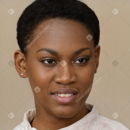 Joyful black young-adult female with short  brown hair and brown eyes