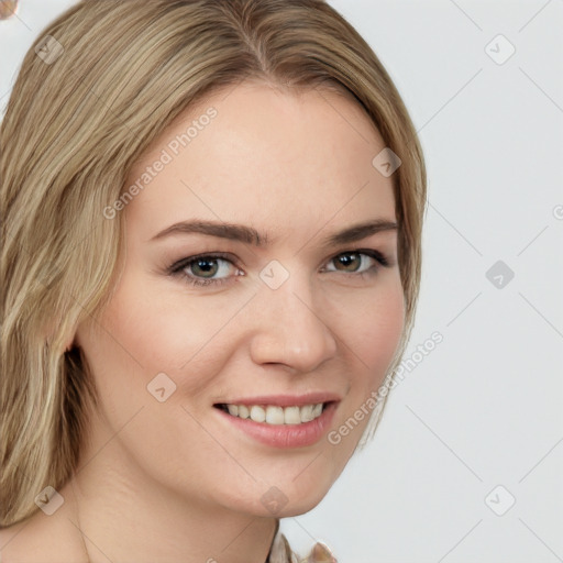 Joyful white young-adult female with long  brown hair and green eyes