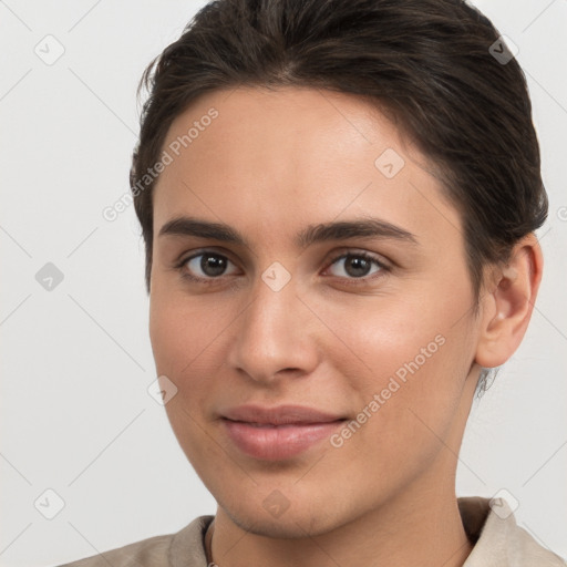 Joyful white young-adult female with short  brown hair and brown eyes