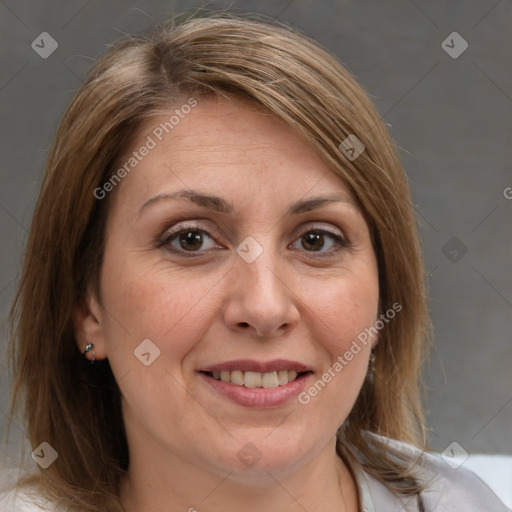 Joyful white adult female with medium  brown hair and brown eyes