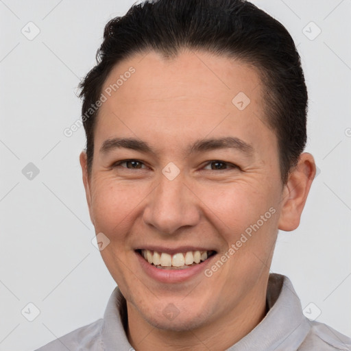 Joyful white young-adult male with short  brown hair and brown eyes