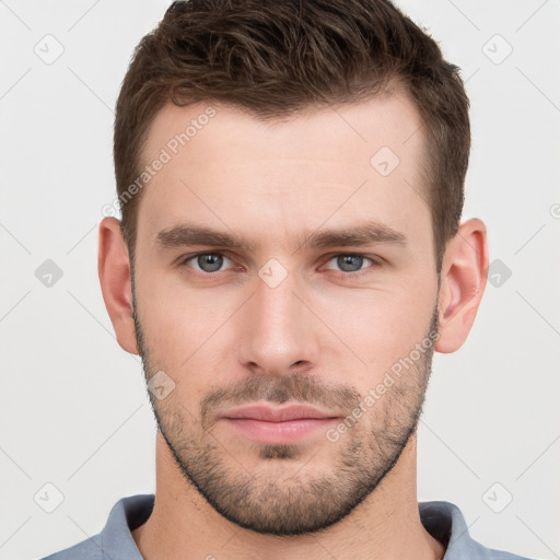 Neutral white young-adult male with short  brown hair and grey eyes