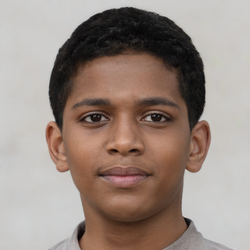 Neutral black child male with short  black hair and brown eyes