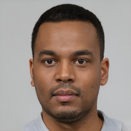 Neutral black young-adult male with short  black hair and brown eyes