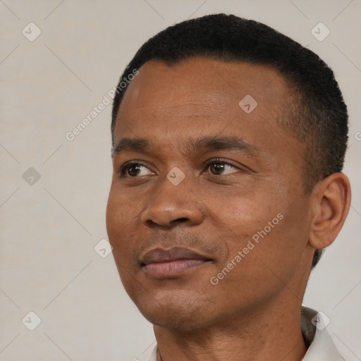 Neutral black young-adult male with short  black hair and brown eyes