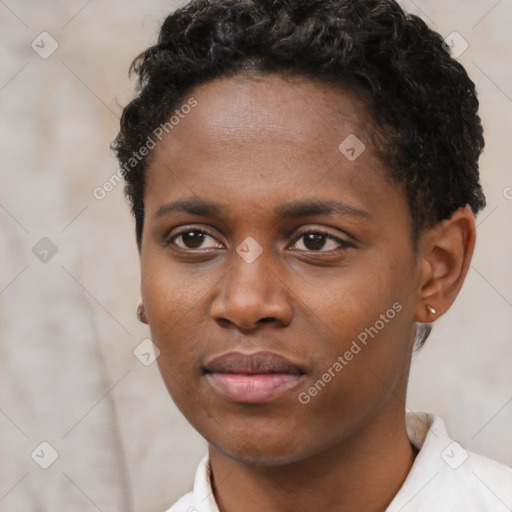 Neutral black young-adult female with short  brown hair and brown eyes