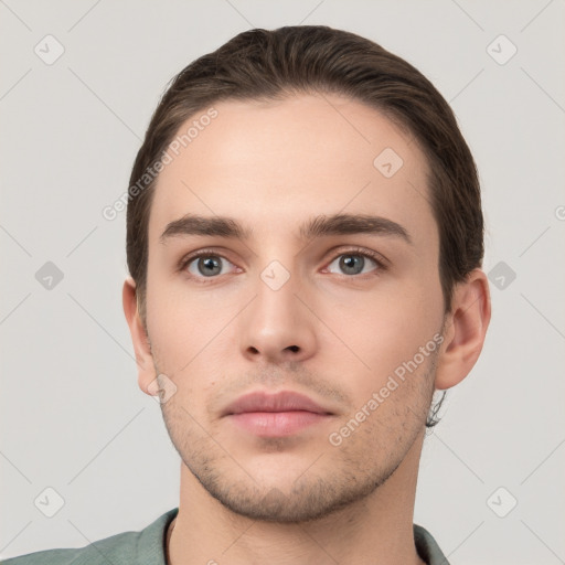 Neutral white young-adult male with short  brown hair and brown eyes