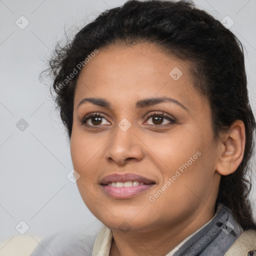 Joyful latino young-adult female with short  brown hair and brown eyes